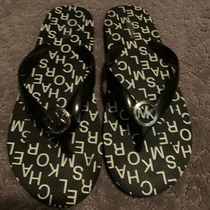 Michael Kors Flip Flop never worn black